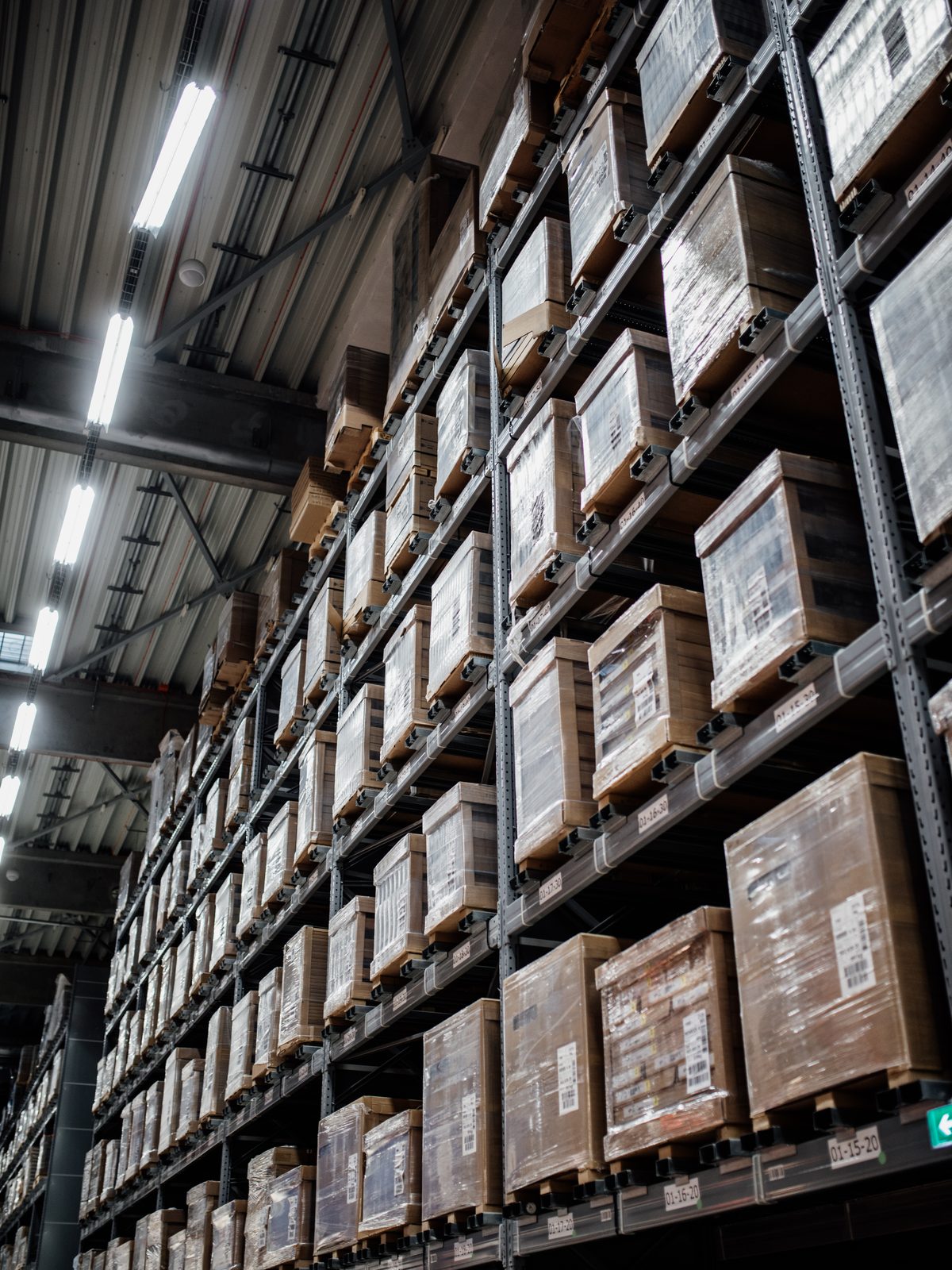 Warehouse aisle with stacked pallets